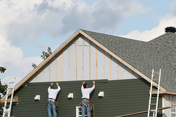 Professional Siding Installation technician working in Clifton, NJ